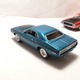 Illustration for article titled AutoWorld vs. Johnny Lightning:1970 Dodge Challengers (T/A vs R/T)
